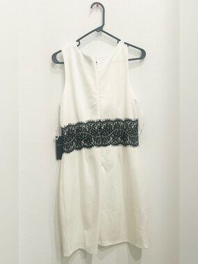 Love Stitch, Brand new 🆕 Sleeveless White Dress with Black Lace Waist